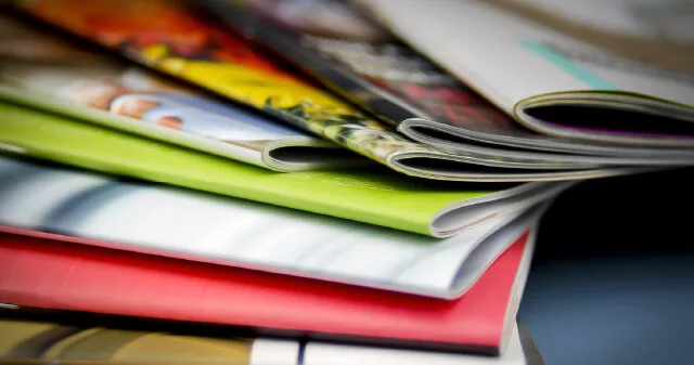 A stack of freshly printed material